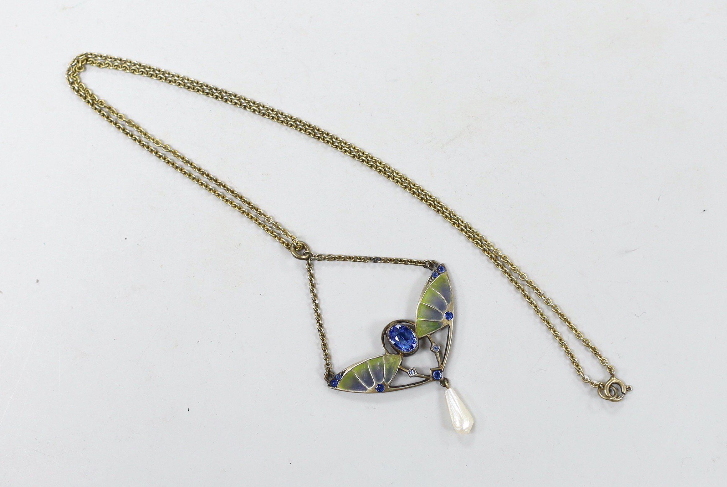 An early 20th century 800 gilt white metal, blue paste, plique a jour and freshwater pearl set drop pendant, width 41mm, on a 925 chain 47cm.